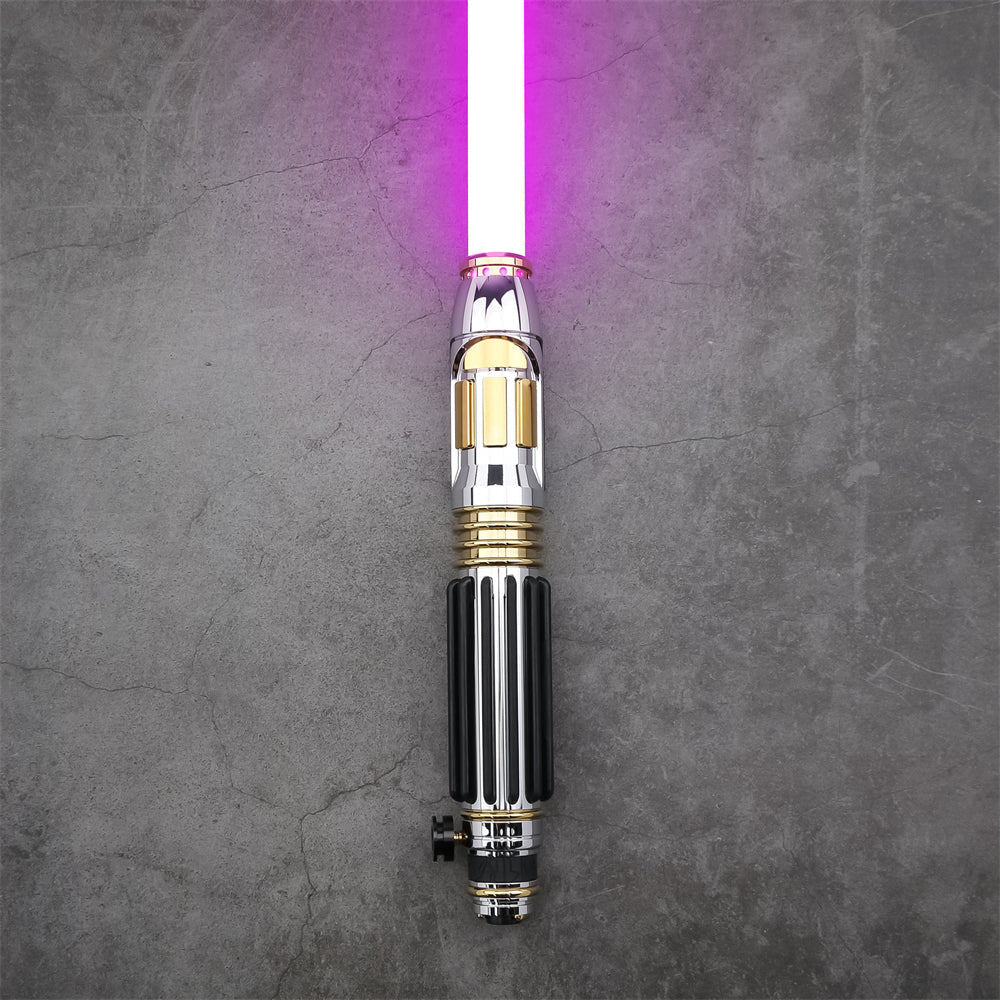 StarForged Electrum Wind saber, gold and silver hilt with a purple blade ignited